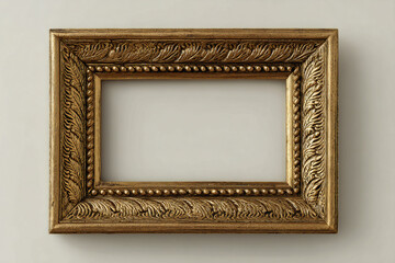 antique gold empty picture frame in wall