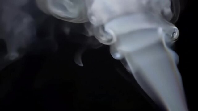 White Smoke Swirl in Slow Motion on Black Background