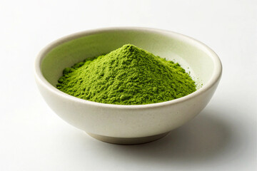 Green Matcha Powder in Off White Ceramic Bowl green tea powder