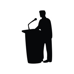 man giving a speech at the podium