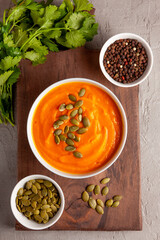 Pumpkin Soup with Fresh Cilantro, Pumpkin Seeds, and Pepper