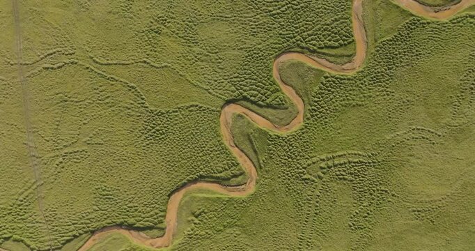Aerial view of yellow river in wetlands, Iceland.
