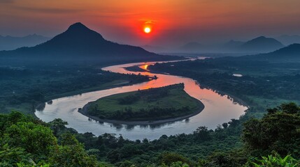 Breathtaking Sunset Over Serene River with Lush Greenery and Majestic Mountains Surrounding Vibrant Colors in Untouched Nature Landscape