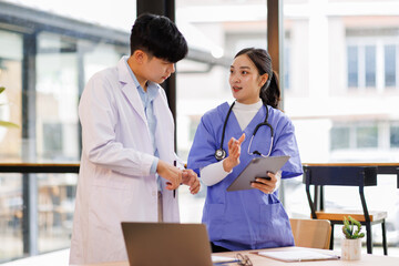 Nurse, doctor or healthcare team with tablet planning schedule, life insurance or medical research...