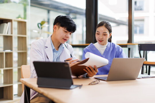 Doctors, nurse or laptop in day healthcare, planning research or surgery teamwork in wellness hospital. Talking, thinking or medical on technology for collaboration help or life insurance app.
