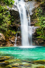 Fototapeta premium a beautiful waterfall with crystal blue water