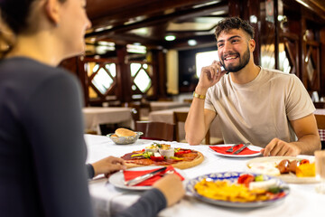 Couple at Resort Restaurant Enjoying Traditional Breakfast