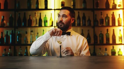Sneaky barman adding drugs into a cocktail, spiking drink, criminal behavior