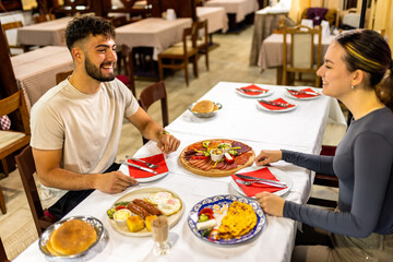 Couple at Resort Restaurant Enjoying Traditional Breakfast