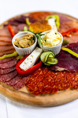 Traditional Serbian Meza Platter with Cured Meats and Sides