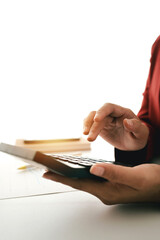Accountant working on desk using calculator to calculate financial report in office business accounting finance concept