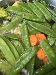 Fresh Green Vegetables in Water with Carrots and Broccoli