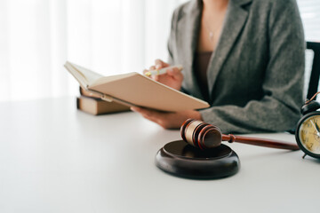 Female consultant or lawyer working in office. Legal concept. Justice and legal advice. Male judge in courtroom.