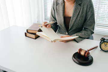 Female consultant or lawyer working in office. Legal concept. Justice and legal advice. Male judge...