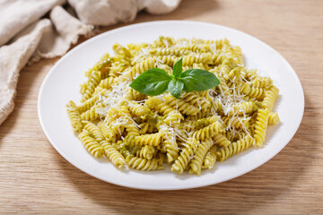 plate of pasta with pesto sauce