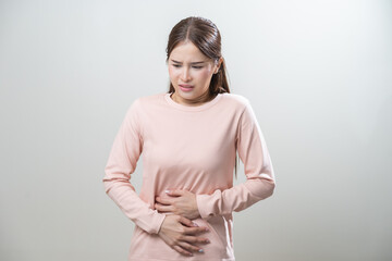 Flatulence asian young woman intolerance hand in stomach ache, suffer from food poisoning,...