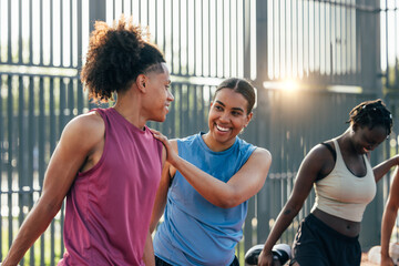 Group exercise in outdoor setting promotes teamwork