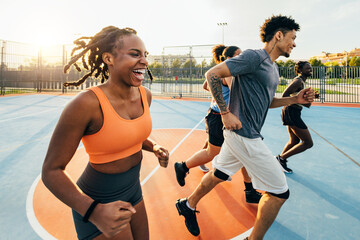 Group of friends enjoying a run on a sunny day