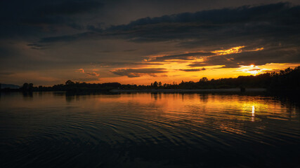 Naklejka premium sunset over lake 