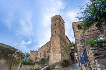 Explore the majestic castle fortress in Trujillo Spain, featuring medieval stone walls, towers, and...