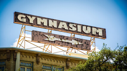 Signposts the direct way to Gymnasium