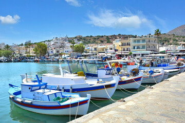  Fishing boats in marina. Elounda is a small fishing town on the northern coast of the island of...