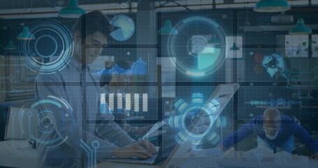 Typing man on laptop and colleagues analyzing AR holographic data at open-plan office, copy space