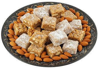 Isolated Traditional Indian Sweets on Decorative Plate with Almonds