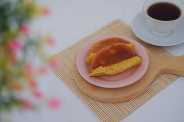 Soft Baked Apem Cake on Pink Plate