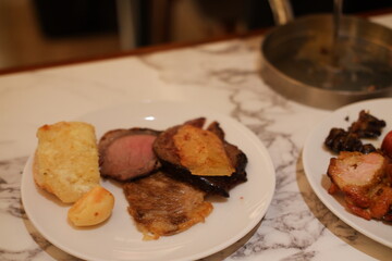 Assorted Grilled Meat and Bread on White Plate