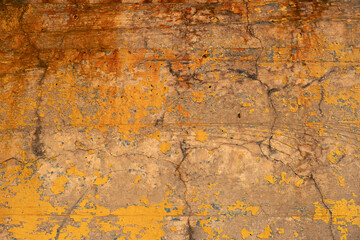 Grunge rusty metal texture with orange, brown and red corrosion patterns forming abstract industrial background for design, printing, overlays, wall textures and creative use.