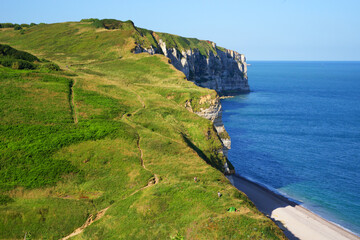 Campers on the GR21 hiking trail. Cliffs and beach of Antifer