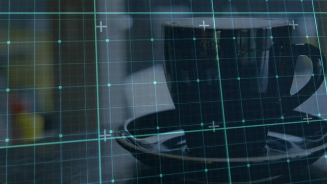 Turquoise grid fading in initiating scan, panning left, expanding coffee cup, centering frame