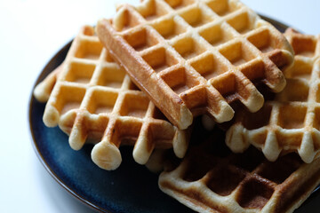 belgian waffles on a plate close-up
