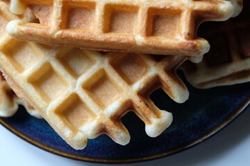 belgian waffles on a plate close-up