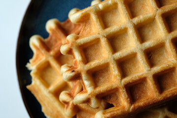 belgian waffles on a plate close-up