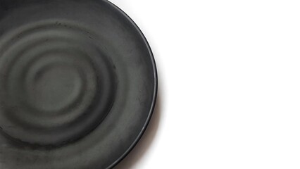 Empty circle black plate with ceramic melamin material isolated on white background