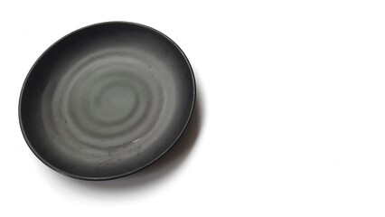 Empty circle black plate with ceramic melamin material isolated on white background
