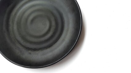 Empty circle black plate with ceramic melamin material isolated on white background