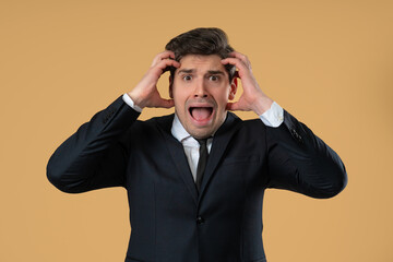 Frightened Businessman On Beige Studio. Phobia, Trouble, Panic, Scary News