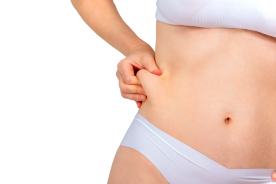 Woman pinching excess skin on her stomach. Concept of removing excess skin after weight loss, bariatric surgery or abdominoplasty.