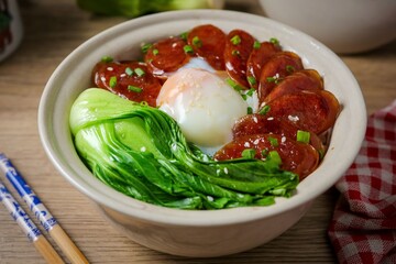 Homemade Rice with sweet Chinese sausage and Green Pakchoi,on sen egg