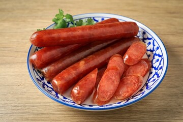 Chinese sausage on wooden background