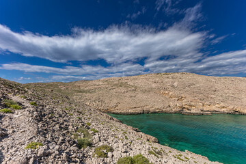 The picturesque bay and pebbly empty beach of Konjska on the island of KRK,