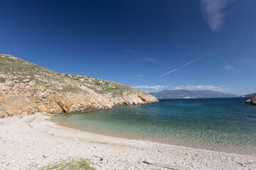 The picturesque bay and pebbly empty beach of Konjska on the island of KRK,