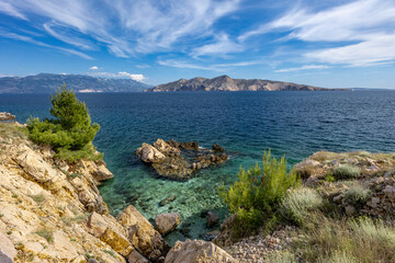The picturesque bay and pebbly empty beach of beach Vreženica on the island of KRK,