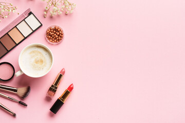 Woman flat lay on pink background.