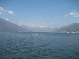Scenic view of Lake Como, Italy with snowcapped Alps mountains in the distance