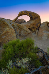 Fototapeta premium Mobius Arch rock formation glowing during sunset in Alabama Hills, California