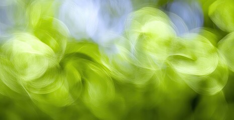Abstract swirling greens and light blues